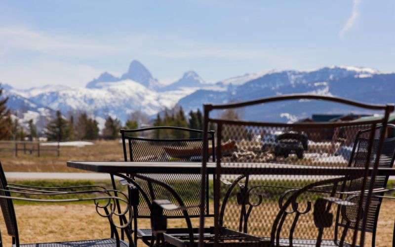 Head out onto the front porch to enjoy a drink and a meal as you take in an amazing view of the majestic Tetons.